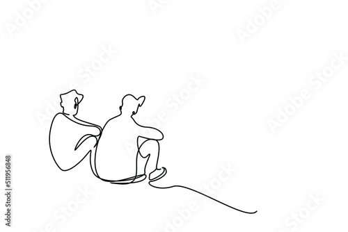 two friends sitting calmly on the floor and thinking back view