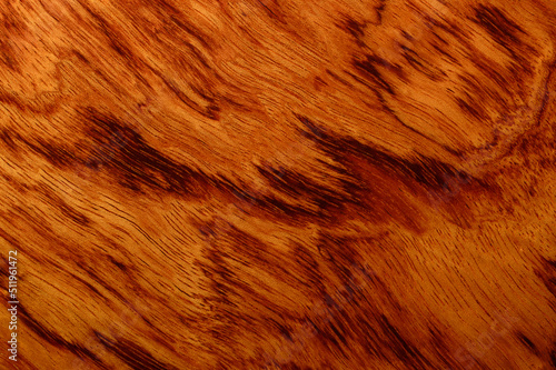 Guitar deck made of bubinga tree. Pretty surface of guitar deck - macro. Background picture.
