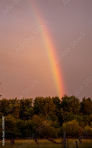 Rainbows over Avebury in Wiltshire. Summer solstice.