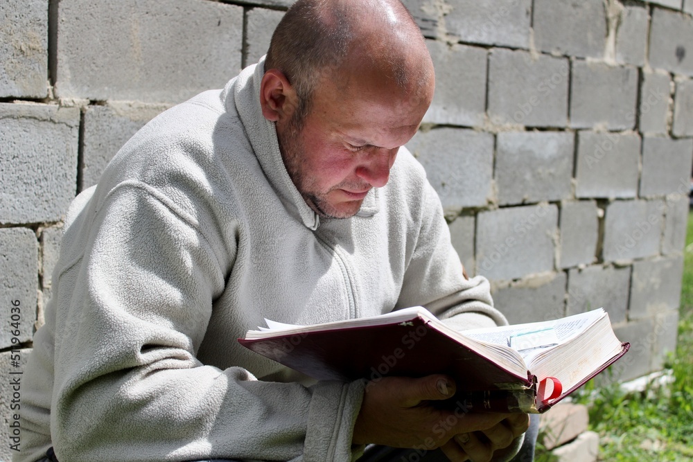 man reading a book man reading a book