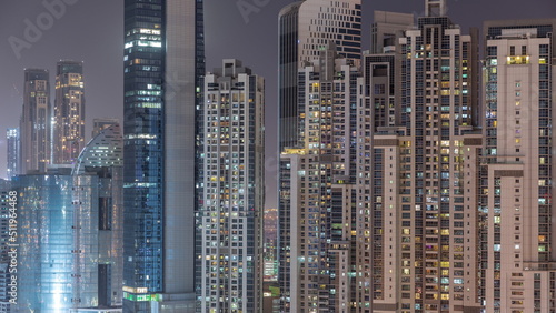 Bay Avenue with modern towers residential development in Business Bay aerial night timelapse, Dubai © neiezhmakov