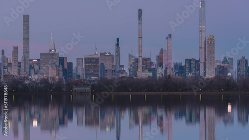 Billionaires Row from Central park night to day time lapse photo