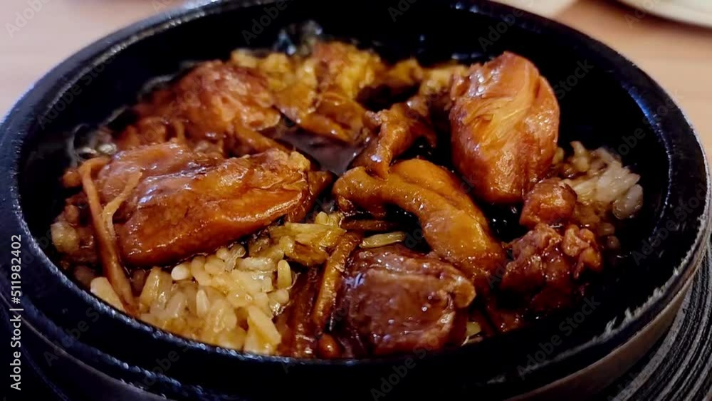 Sesame oil chicken rice with mushroom. The chef cooked the dishes with