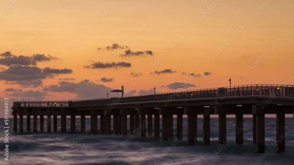 The Crescent moon rises over the pier in Miami The Crescent moon rises over the pier in Miami