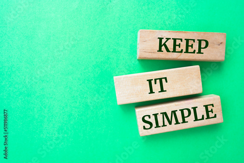 Keep it simple - word from wooden blocks with letters, to make something easy, keep it simple concept