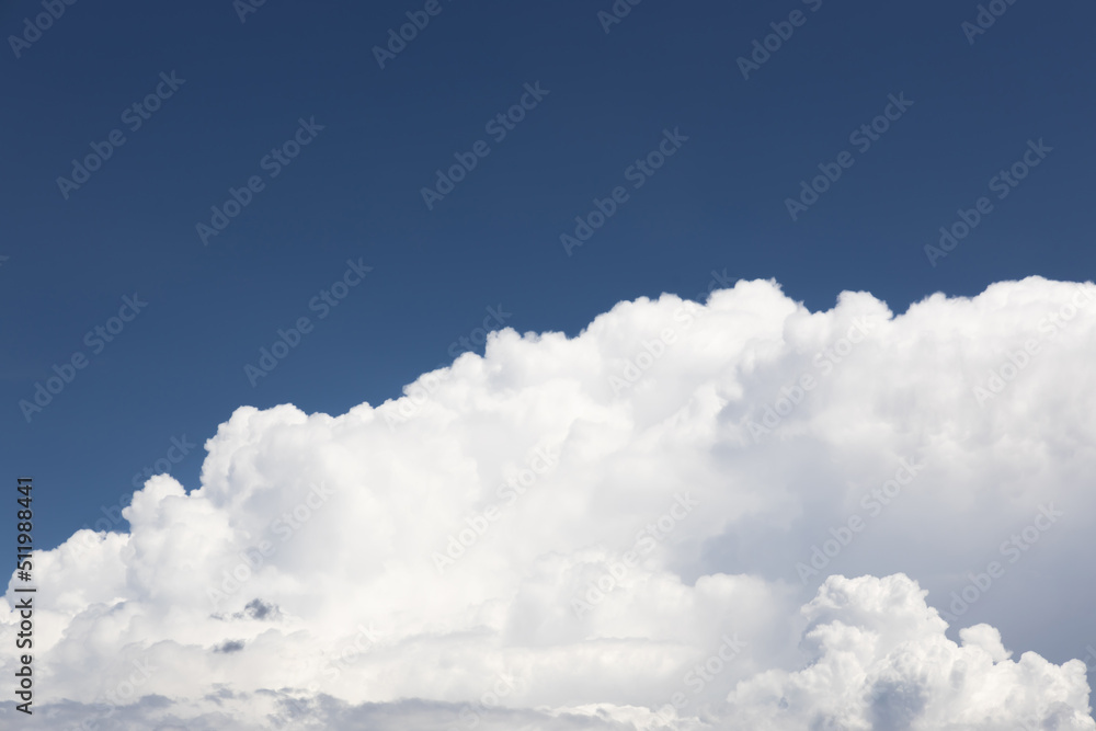 white fluffy clouds in the blue sky .blue sky background with tiny clouds white fluffy clouds in the blue sky .blue sky background with tiny clouds