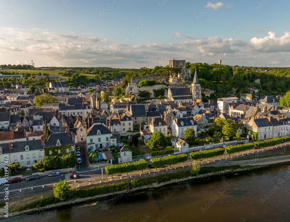 Fototapeta premium Aerial view of Château de Montrichard a ruined 11th-century castle at the heart of the commune of Montrichard in the Loir-et-Cher département of France with romanesque style donjon keep, battlements