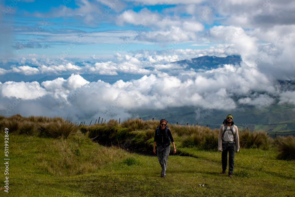 Hikers above the clouds in the andes Hikers above the clouds in the andes