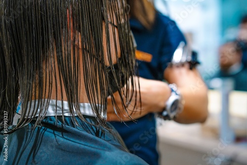 Man getting haircut at salon © adrianad