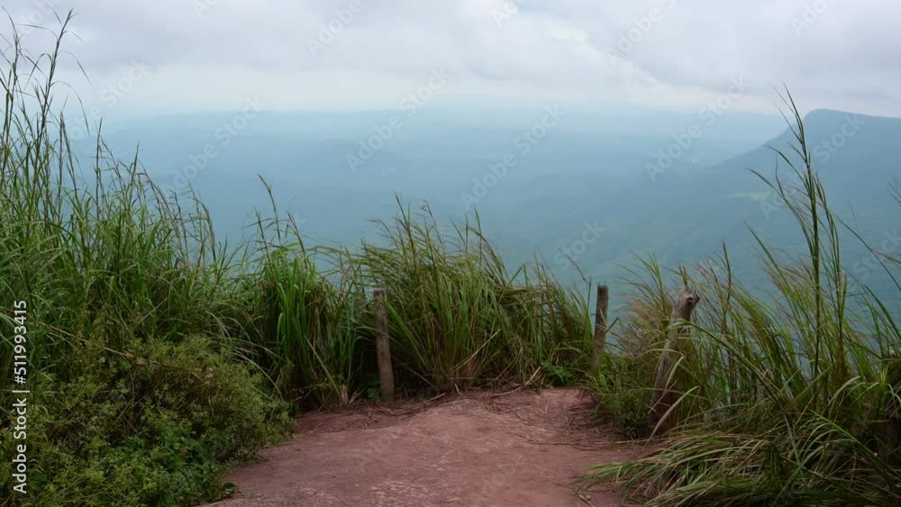 The movement of clouds and fog on the mountains in the rainy season at Viewpoint Pha Hua Sing at Phu Thap Berk in Thailand. The movement of clouds and fog on the mountains in the rainy season at Viewpoint Pha Hua Sing at Phu Thap Berk in Thailand.