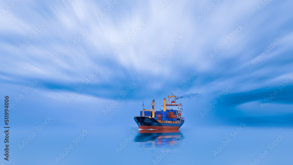 container cargo ship floating and reflecting as a shadow blur at the sea surface and torm background, business and industrial service import export transportation international concept,