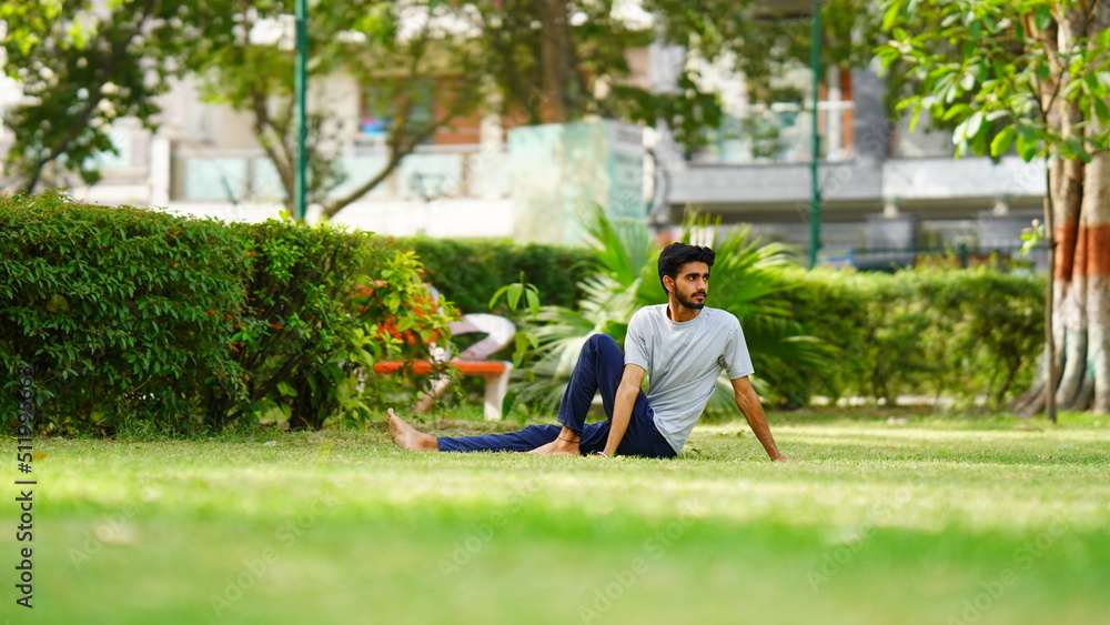 Fototapeta premium man practicing yoga in India