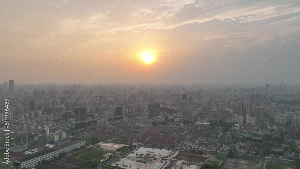 Drone aerial view of Buildings and city in the beautiful sunset. Sunset glow and the downtown city of Shanghai China, cityscape of asian city. Business, travel and life style concept b-roll footage. Drone aerial view of Buildings and city in the beautiful sunset. Sunset glow and the downtown city of Shanghai China, cityscape of asian city. Business, travel and life style concept b-roll footage.