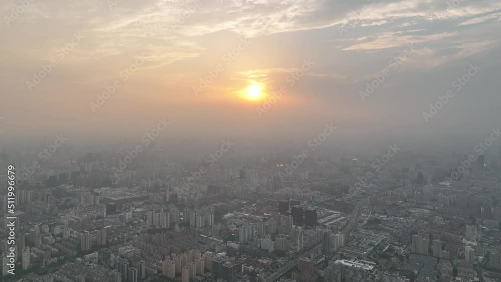 Drone aerial view of Buildings and city in the beautiful sunset. Sunset glow and the downtown city of Shanghai China, cityscape of asian city. Business, travel and life style concept b-roll footage. Drone aerial view of Buildings and city in the beautiful sunset. Sunset glow and the downtown city of Shanghai China, cityscape of asian city. Business, travel and life style concept b-roll footage.