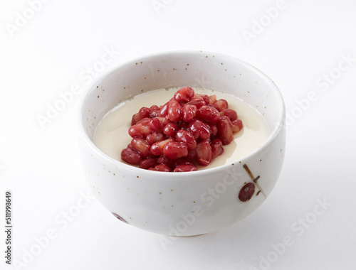 Delicious Chinese dessert, red bean double skin milk .on white background photo