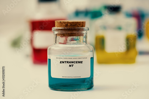 Entrancement. Pheromones, hormones and neurostimulants chemicals that regulate human emotions and mood. Aromatic extract in vintage pharmacy bottle photo