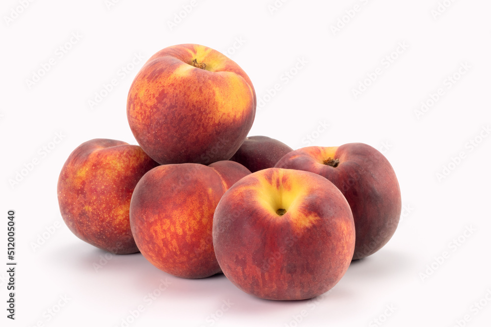 Peaches isolated on bright background. Close up view. Peaches isolated on bright background. Close up view.