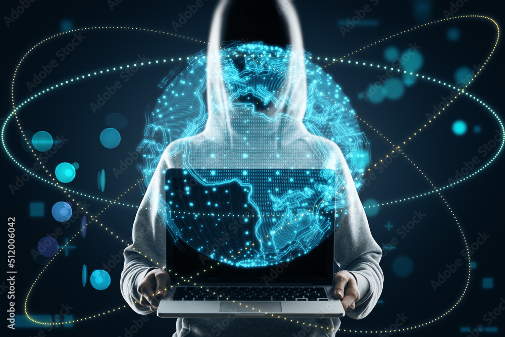 Hacker hand holding laptop with bright globe hologram. A holographic ...