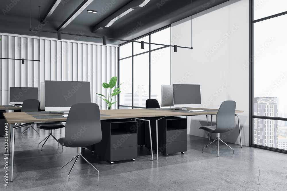 Perspective view on modern interior design coworking office with dark grey chairs, concrete floor, wooden tables and city view from huge windows. 3D rendering Perspective view on modern interior design coworking office with dark grey chairs, concrete floor, wooden tables and city view from huge windows. 3D rendering
