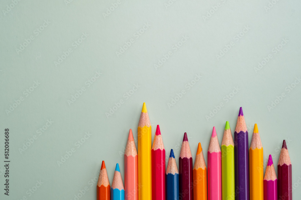 Fototapeta premium Colored pencils background, back to school concept