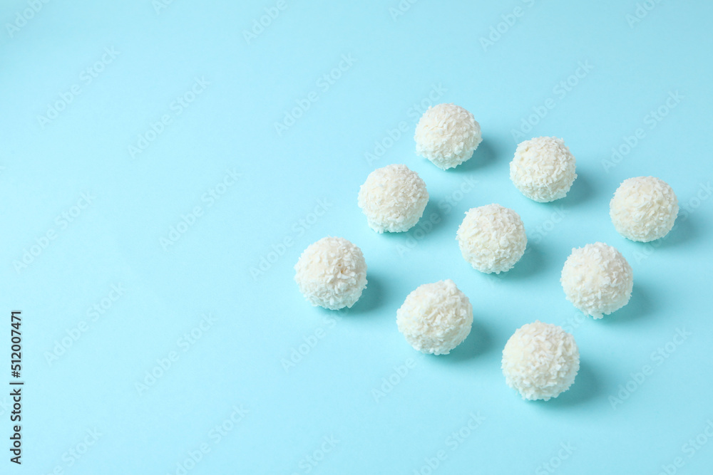 Concept of tasty sweets, coconut candies, space for text Concept of tasty sweets, coconut candies, space for text
