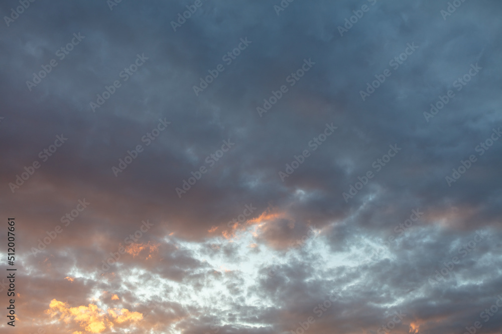 Clouds in the sky at sunset background.