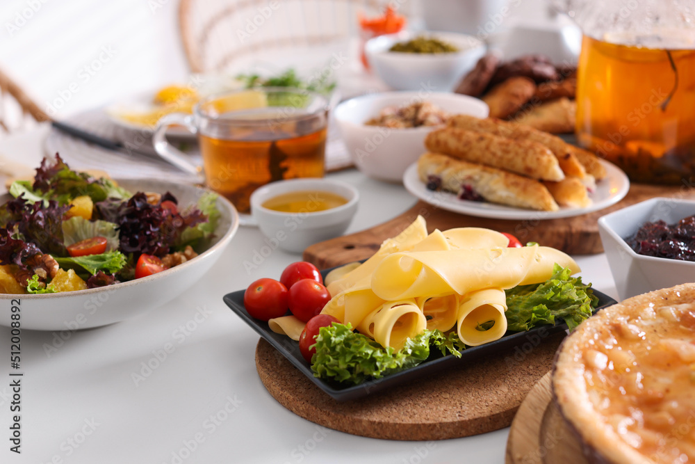 Many different dishes served on buffet table for brunch Many different dishes served on buffet table for brunch