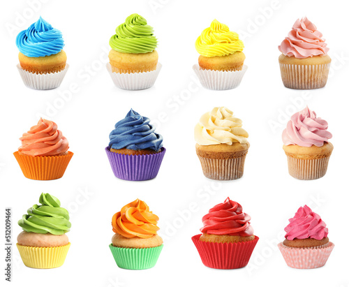 Set of colorful birthday cupcakes on white background