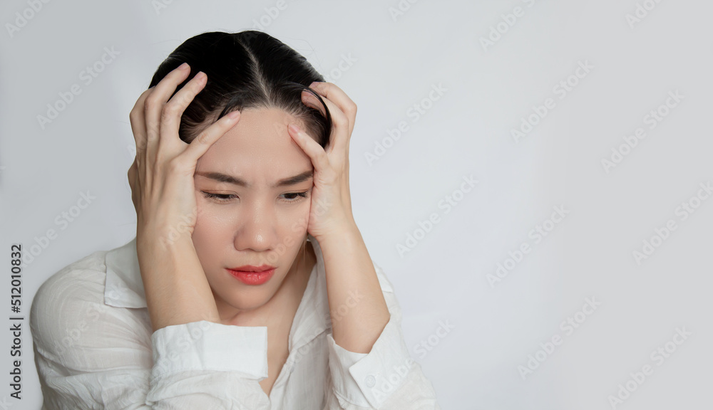 Asian Beautiful woman looking to window and thinking with stress and lonely . Depress and Unhealthy and Mental concept Asian Beautiful woman looking to window and thinking with stress and lonely . Depress and Unhealthy and Mental concept
