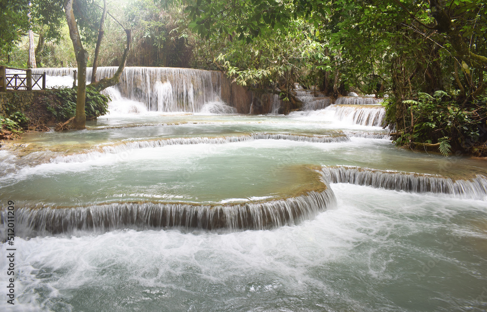 Obraz premium Tat Kuang Si Waterfalls is one of the waterfalls. Located about 32 kilometers from Luang Prabang, Laos, it is known as the most beautiful waterfall of Luang Prabang. Laos PDR 