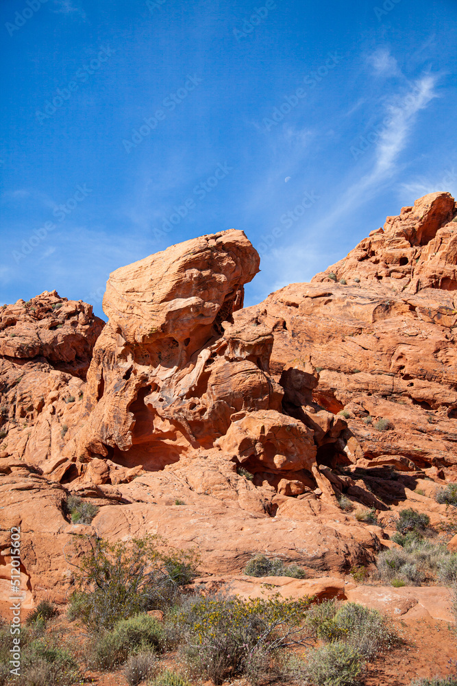 Red sandstone eroded with a road winding through the national park in America
