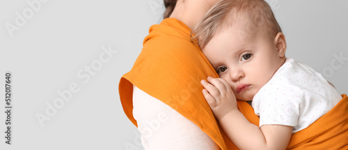 Mother with cute little bab...