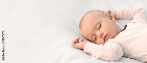 Fotografie, Obraz Cute little boy sleeping in bed with space for text