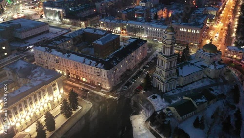 Top view on a winter Christ-Nativity Cathedral in the city center and residential quarters evening in Lipetsk, Russia.  photo