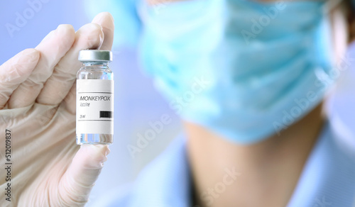 Doctor with vaccine against monkeypox, closeup