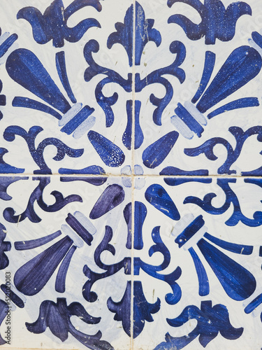 Four beautiful hand-painted azulejo blue tiles up close