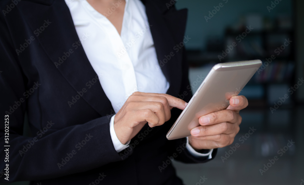 Senior woman use touchscreen mobile. she working in office. communication wireless internet hi speed.staff woman professional. technology for business or finance concept. Senior woman use touchscreen mobile. she working in office. communication wireless internet hi speed.staff woman professional. technology for business or finance concept.