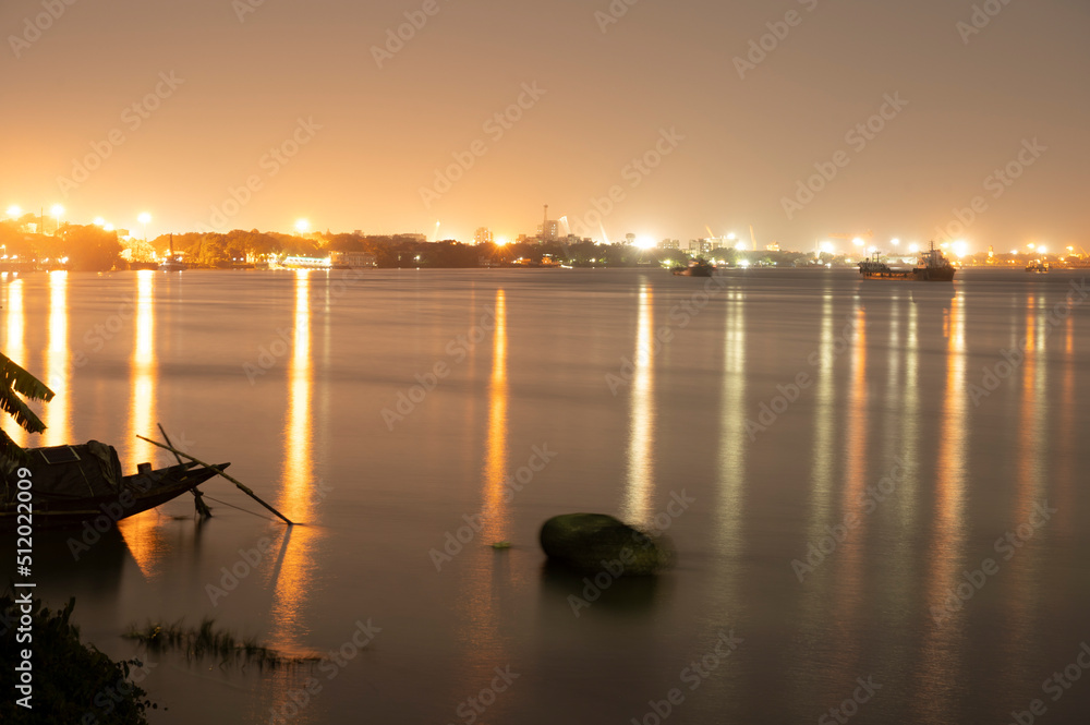 night life on a river. Beautiful famous Kolkata night time . light reflection on Ganges top sights. Travel tourism in Kolkata.