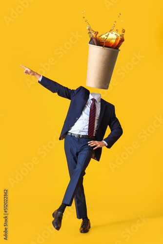 Dancing businessman with cu...
