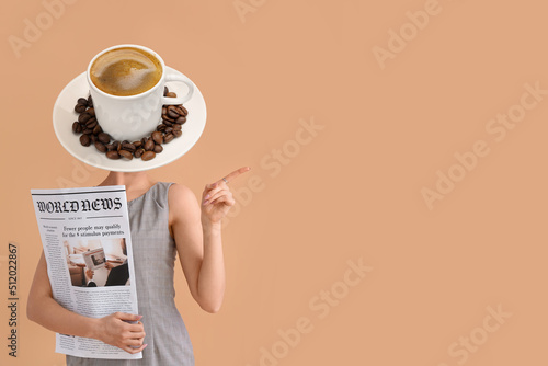 Woman with cup of hot coffe...