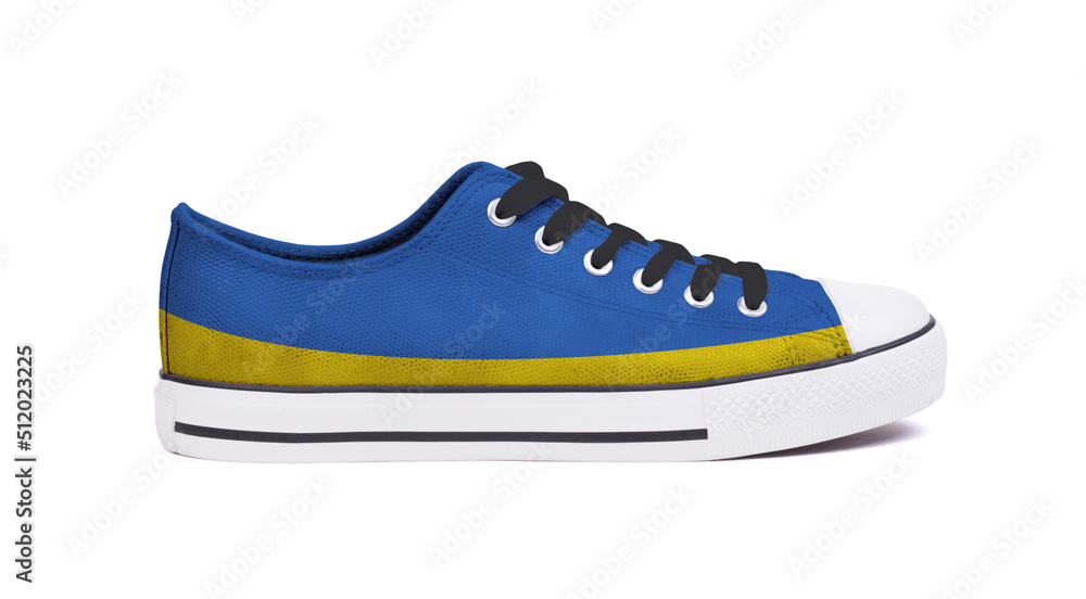Sneaker in the colors of the Ukrainian flag, isolated Sneaker in the colors of the Ukrainian flag, isolated