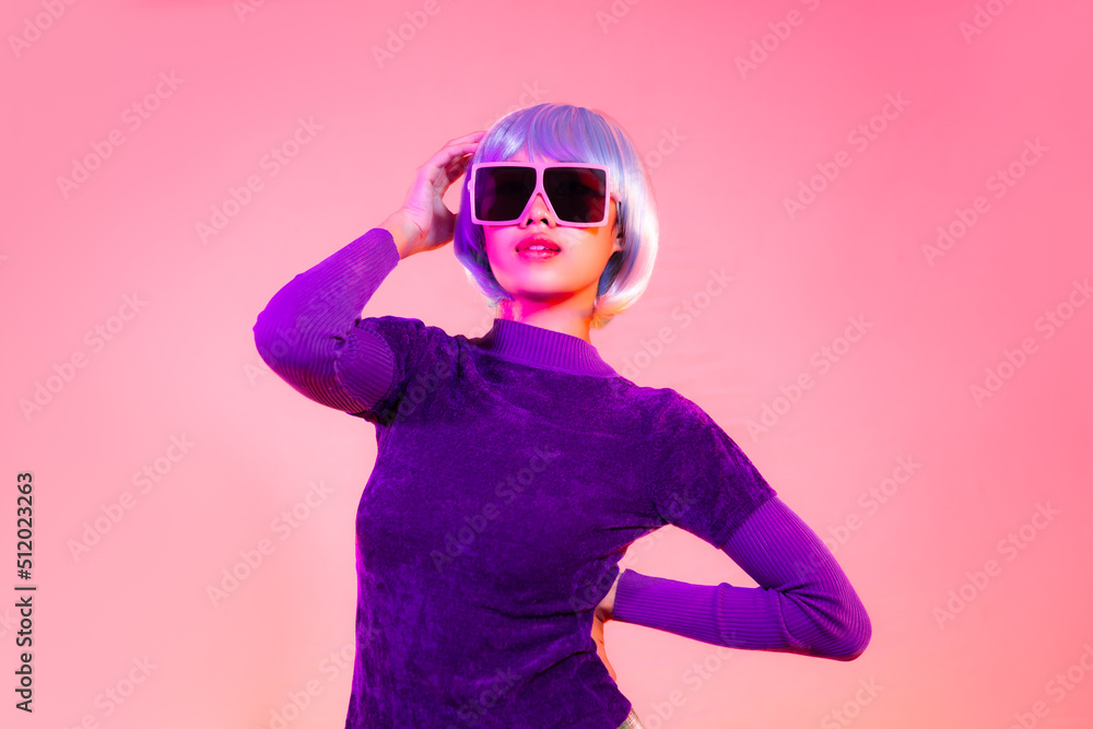 Cyber punk girl concept, asian woman in purple sweatshirt silver and blue short hair style wearing sunglasses. Cyber punk girl concept, asian woman in purple sweatshirt silver and blue short hair style wearing sunglasses.