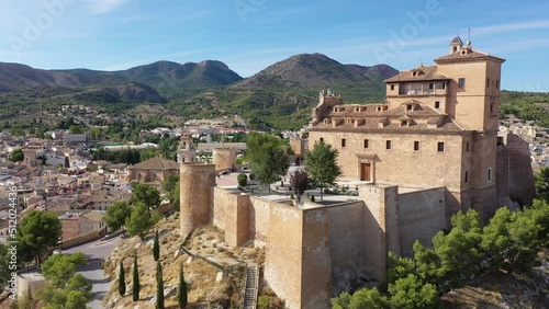 View from drone of historic center of Spanish city of Caravaca de la Cruz overlooking ancient fortified Castle and Basilica of Vera Cruz, region of Murcia photo