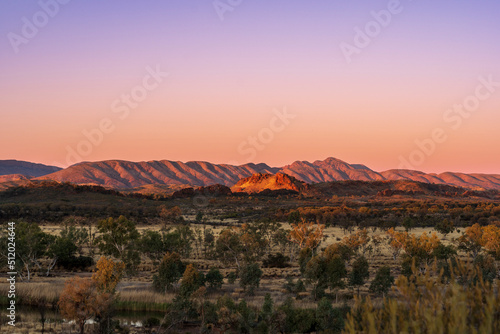 View of the West Macdonnel ranges from the Mt Sonder lookout at sunset, Central Australia. photo