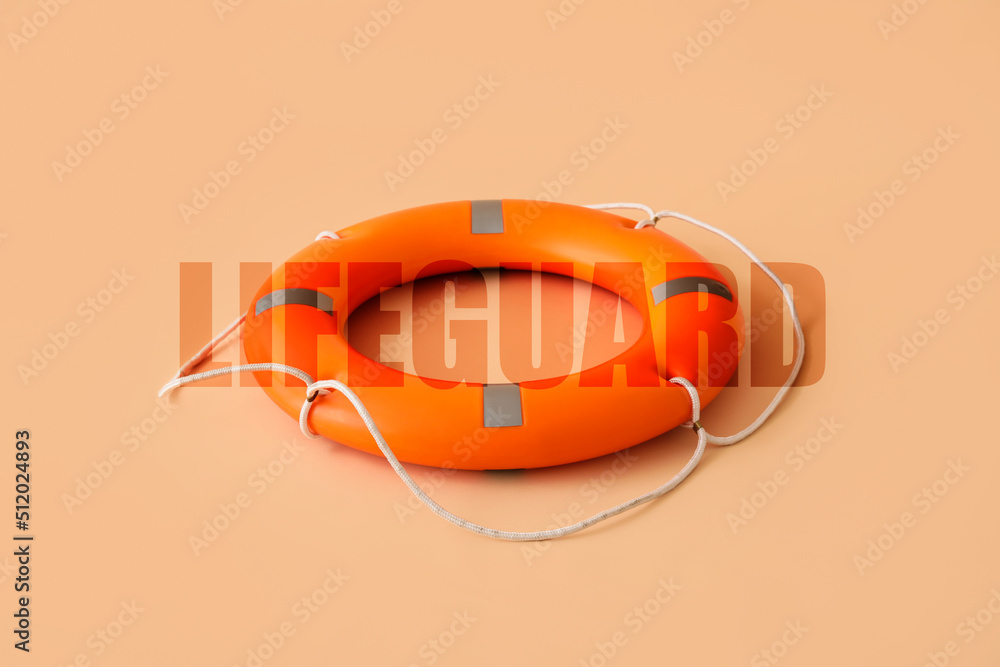 Obraz premium Lifebuoy ring on orange background