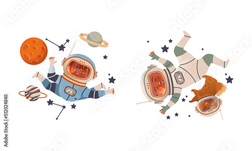 Boys in spacesuits flying in outer space set. Cute children dreaming of becoming astronauts vector illustration