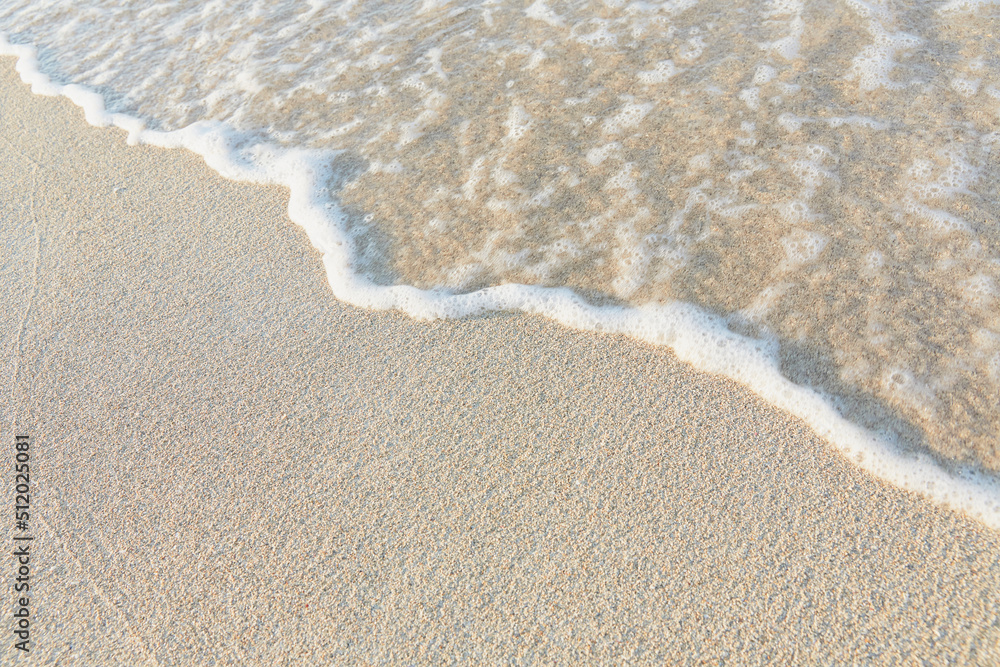 Close-up of white sand, washed by soft sea waves Close-up of white sand, washed by soft sea waves