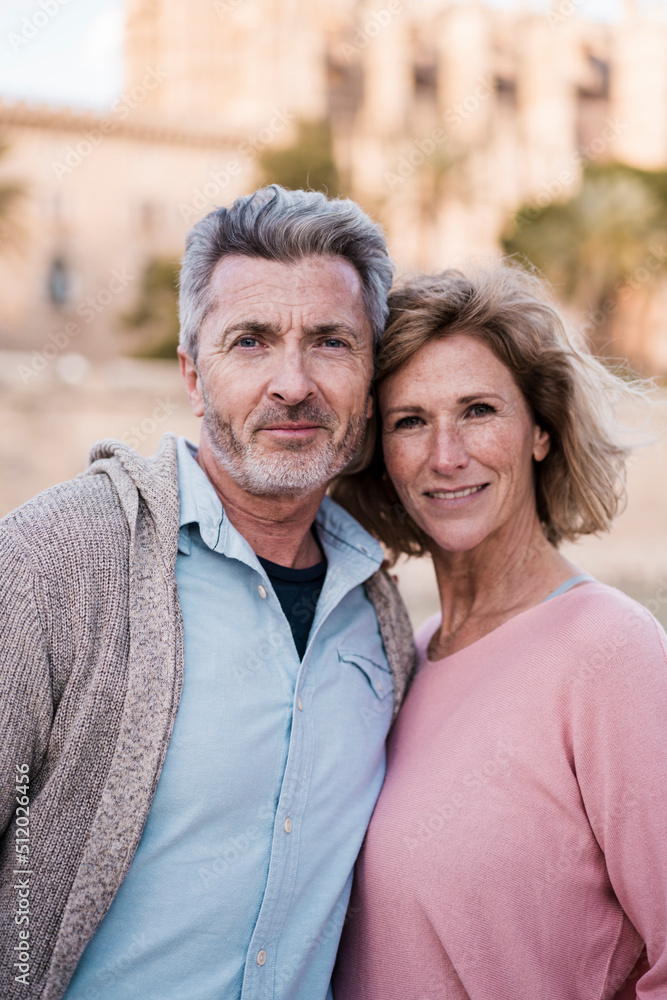 Confident mature couple in casuals Confident mature couple in casuals