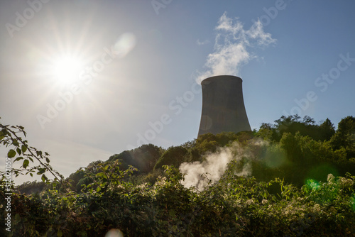 Power plant at geothermal natural park Biancane on sunny day