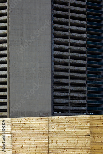 Germany, Hesse, Offenbach am Main, Fenced high-rise building before demolition photo